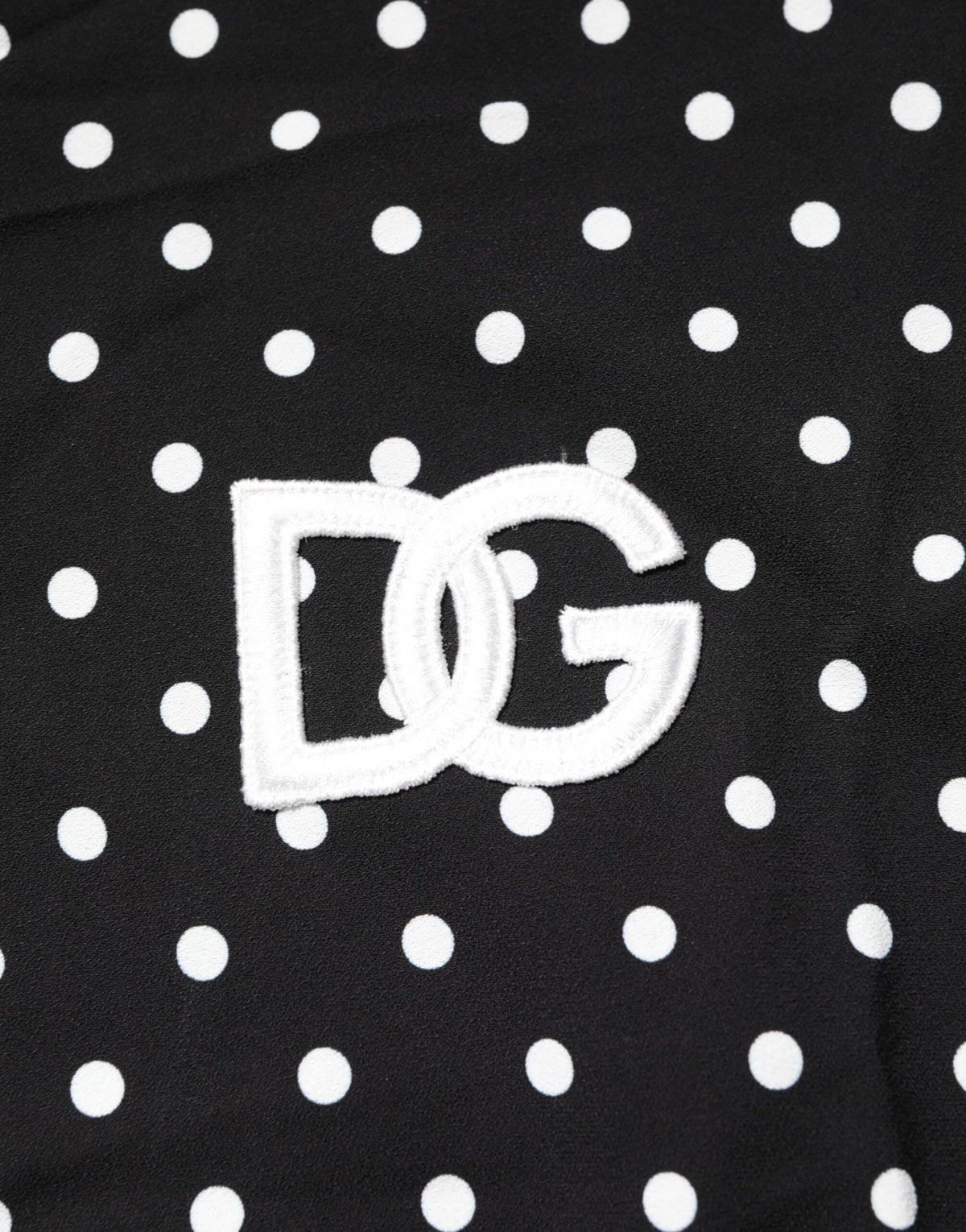 Dolce & Gabbana Schwarzes gepunktetes Polo-T-Shirt mit kurzen Ärmeln und Kragen